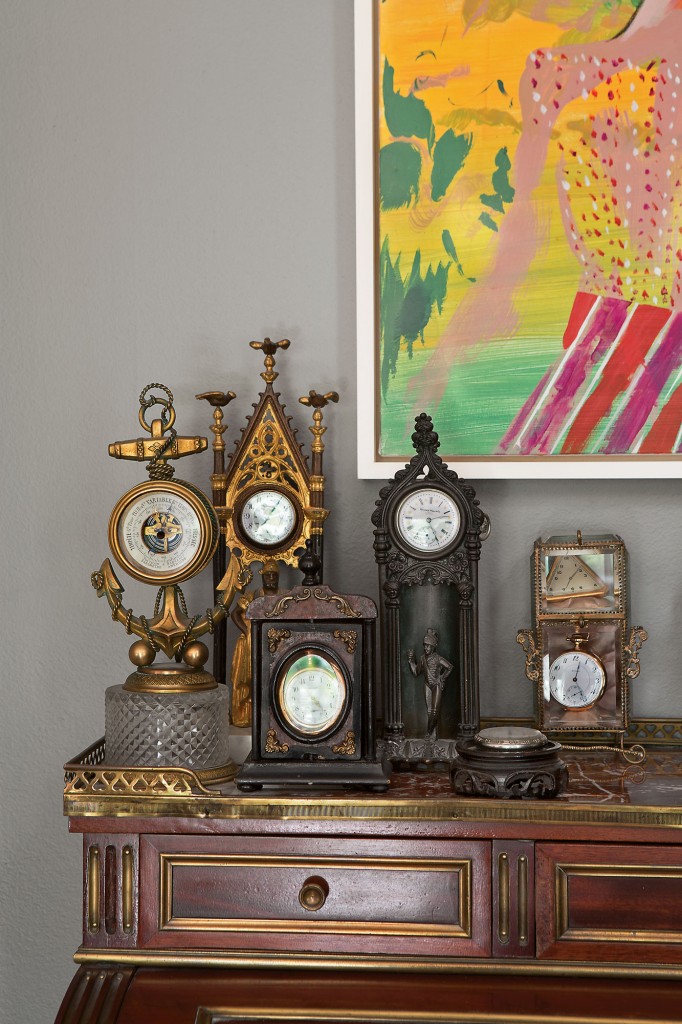 The clocks on the 19th-century Louis XVI-style cylinder bureau were collected by Gordon’s grandparents. Jackie Gendel’s Victoria Nile.