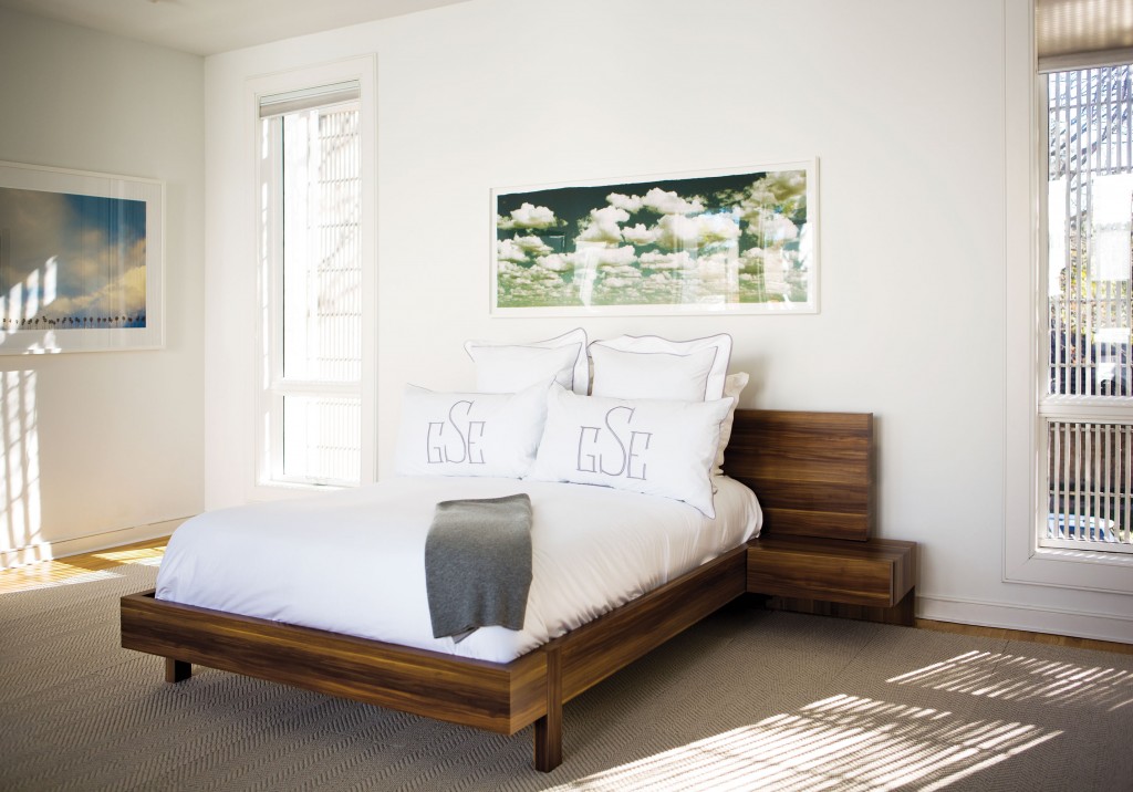 Master bedroom walnut bed is from Scott + Cooner. Santa Fe Clouds photograph by Jeff
Scott. Photo of palm trees and clouds by Steve Wrubel. On bed, Leontine Linens embroidered pillows and Sferra sheeting.