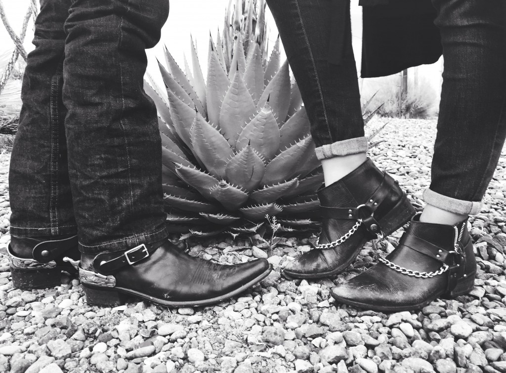 Spurs and chains on our black boots to combat the rough desert terrain and the prickly cactus plants