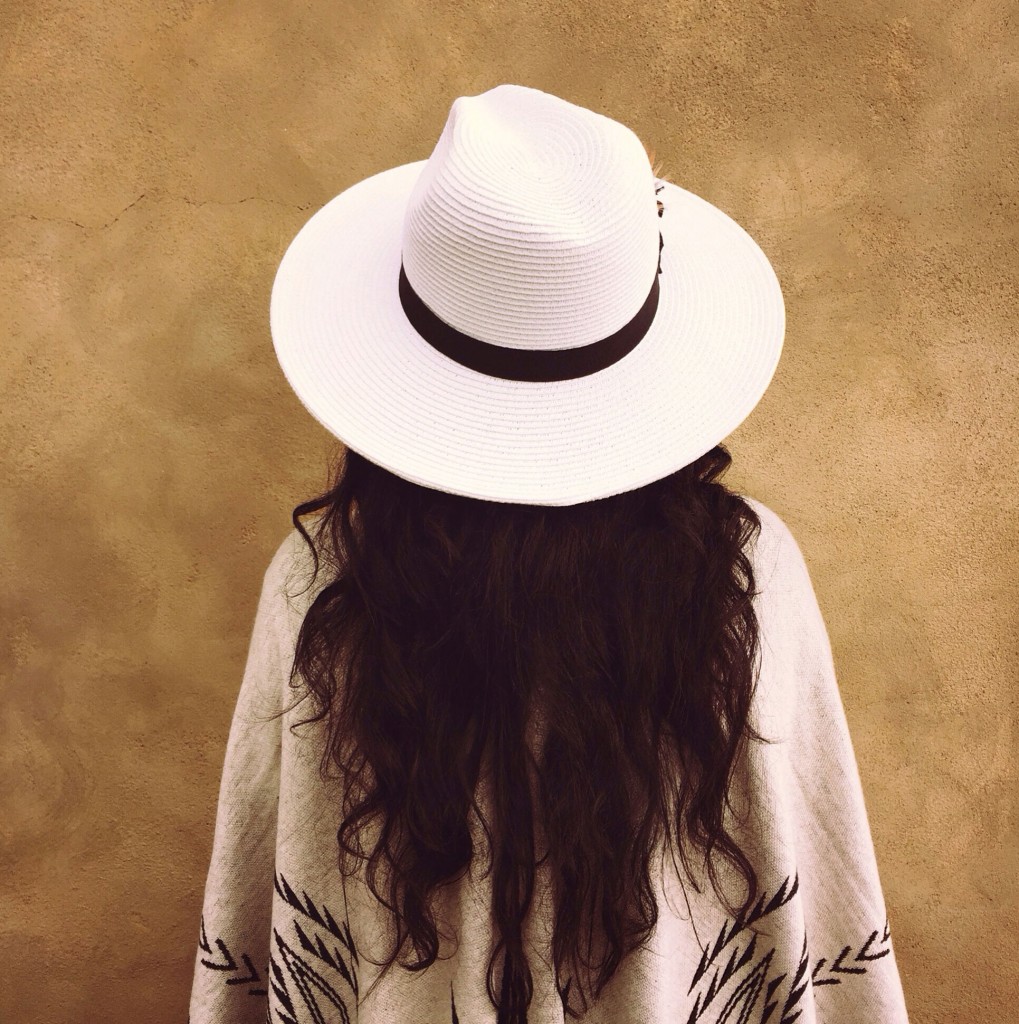 Desert essentials: a hat and a lightweight poncho