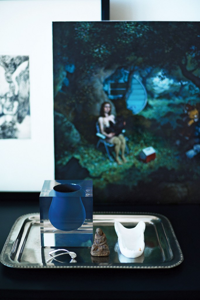 A painting by Erik Thor Sandberg,
Ferment, 2010, acquired by Dailey at TWO x TWO for AIDS and Art. Vase suspended in acrylic was a gift from Jonathan Adler.