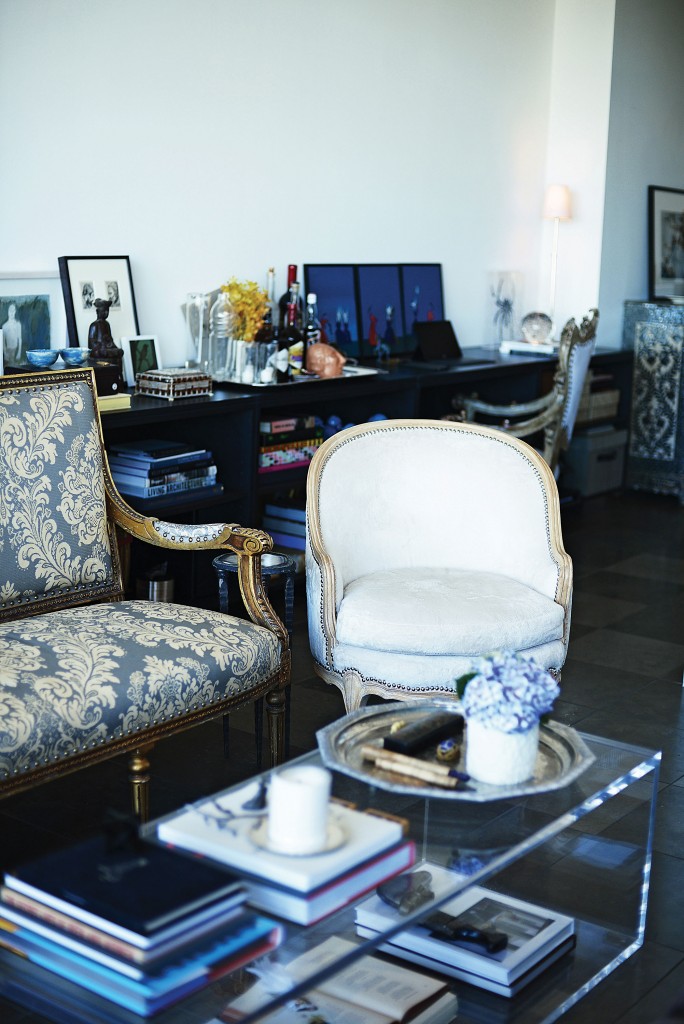 The Lucite coffee table is Dailey’s own design. He found the tray in Saudi Arabia; it now holds a collection of betel-nut containers, an 18th-century Chinese wine cup and an Egyptian scarab.