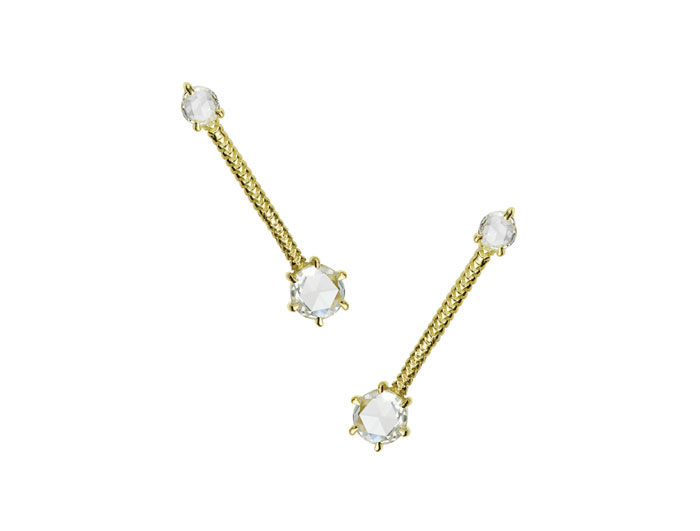 The edgy Revival bar studs detailed in 18-karat yellow gold with rose cut diamonds are the perfect go-to earrings.