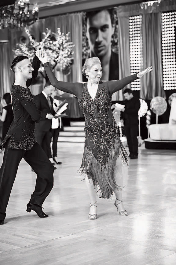 Professional dancer/teacher Stefan Golubovic and
Parker competing in Tampa in June, where they snagged nine first-place ribbons.