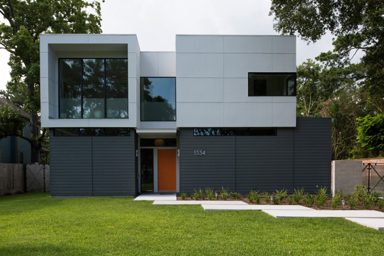 Intexure Architect's Rame Hruska created this stunning design in the Garden Oaks neighborhood. The home is divided in half by a central axis. 