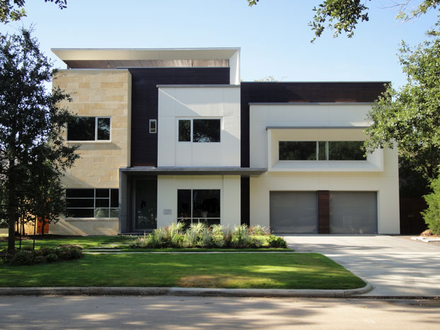 This house by Mark Atkins of MASA Studio Architects welcomes the public with a large, pivoting glass door. 