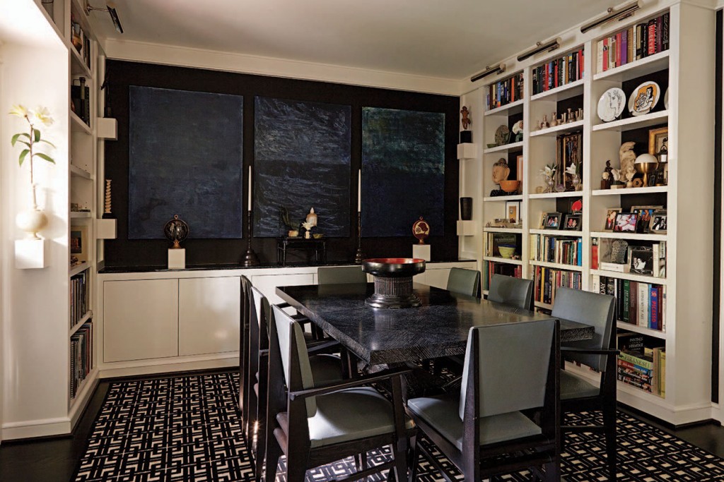 In the dining room, a triptych by New York artist David Parke. Quarter-sawn black oak table, 1940s. Charlotte Perriand chairs.
Rug from Creative Flooring Resources.