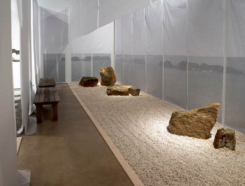 The only movement implied in "I Am Content" is the trail of an implement used to rake the rock garden.