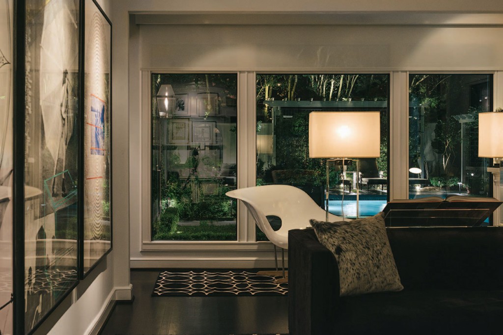 Eames chaise, circa 1950. Robert Rauschenberg triptych.