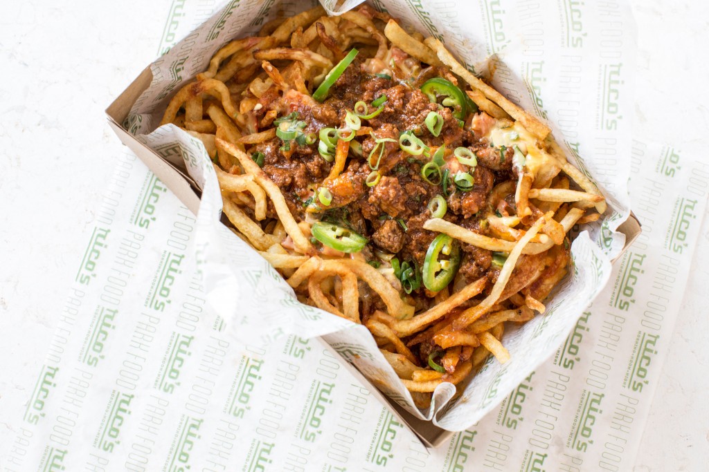 Rico's chili cheese fries served with spicy chili and chili con queso.