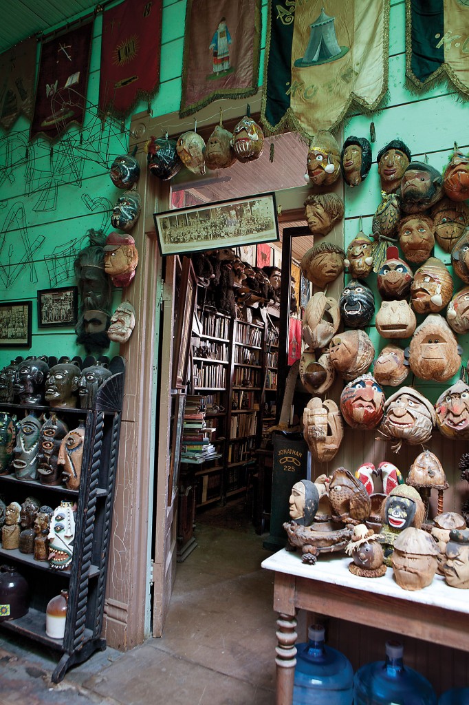 Entrance into lodge
collection room with
carved coconut heads
and face jugs signals this
is a domain not for the
faint-hearted.