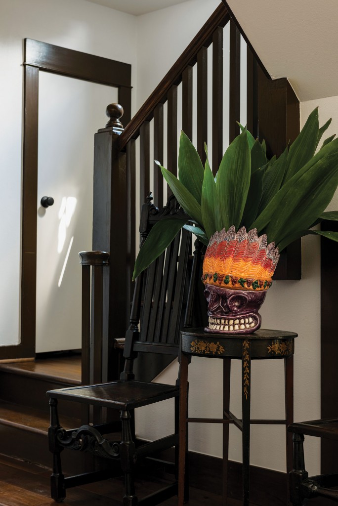 In the foreground, a rare sculpture by Houston’s Earl Staley, circa 1980s, rests upon a Japanned, lacquered English table from the mid-19th century. Table flanked by William and Mary-period chairs.