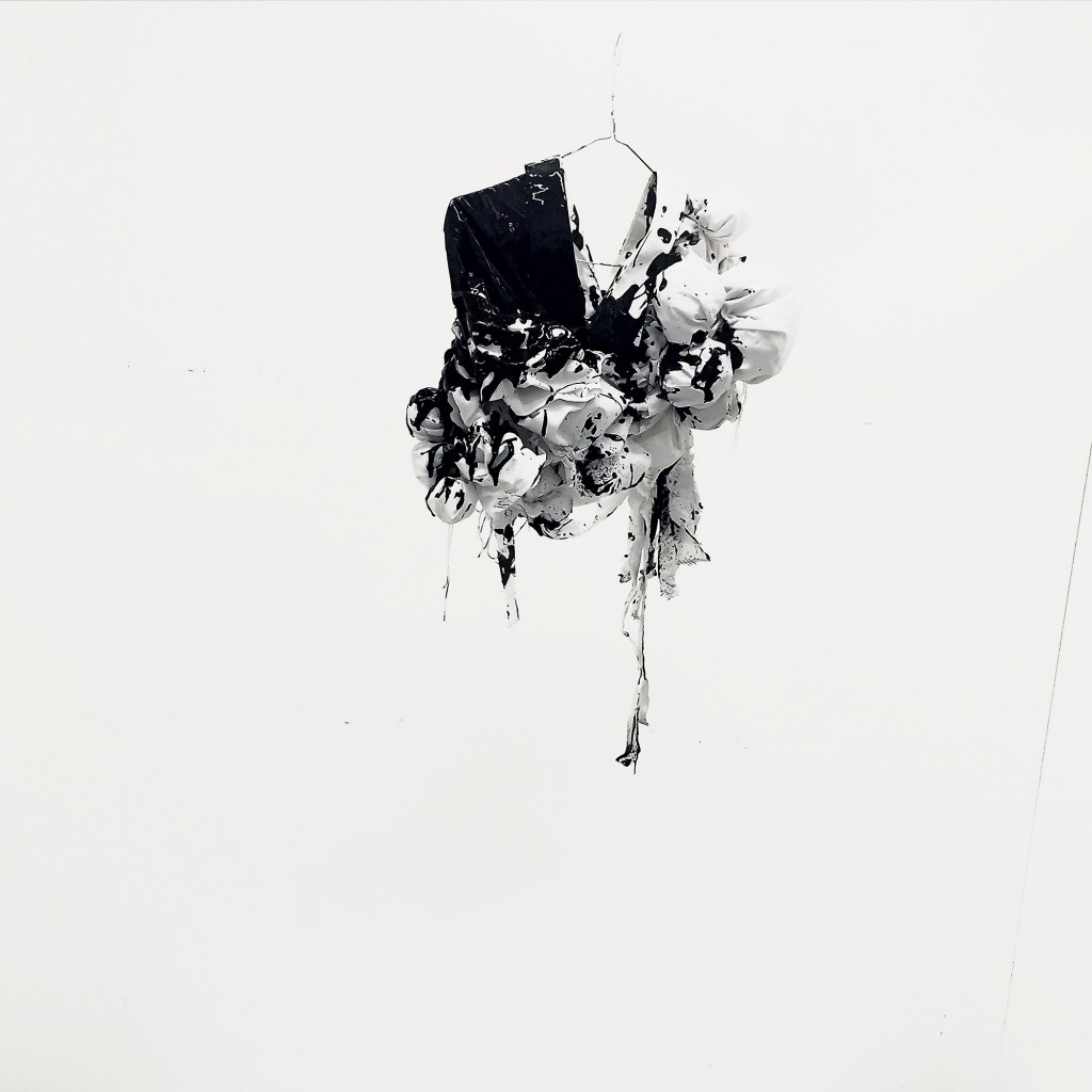 Reinterpretation of a white button-down shirt inspired by the use of petroleum — a class project