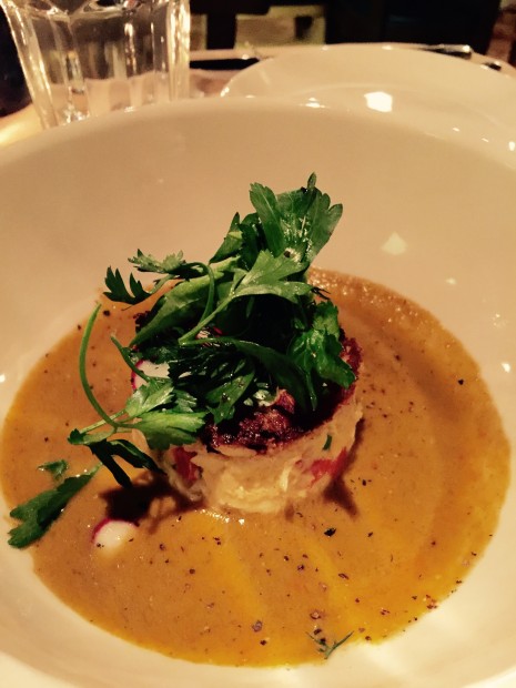 A dish done well: Roost's crab cake and tomato gazpacho.