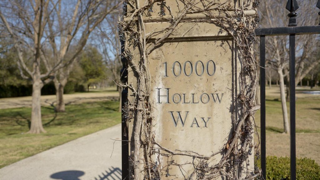 Beyond this simple shingle is the most expensive mansion in Texas.