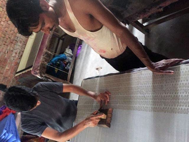 Blockprinters hand stamp each section of fabric using wooden blocks. The print is intentionally imperfect.