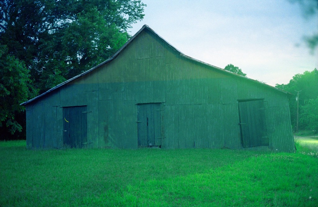 This view of a green warehouse at twilight in Newbern, Alabama, was inspired by another American chronicler of the deep south, William Christenberry, who photographed this same subject years earlier.