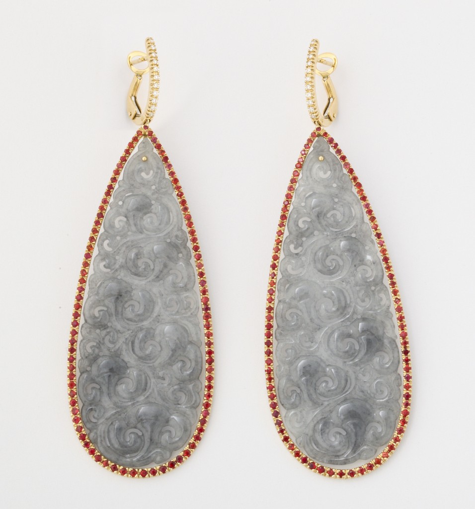 Carved jade, orange sapphire, and diamond hanging ear pendants at Michael Kanners 
