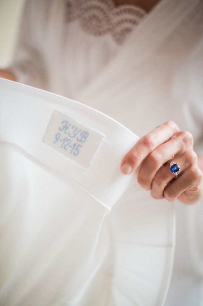 Something Blue: Heather’s married initials, Heather Young Branch, and the date of her wedding were stitched in to her Oscar de la Renta gown.