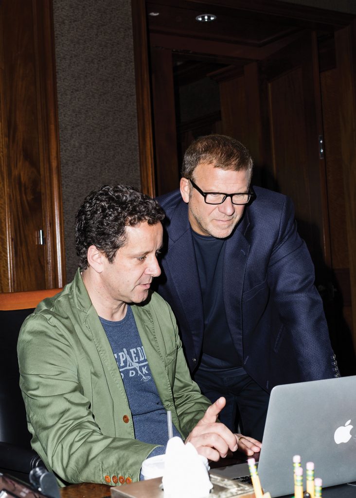 "Billion Dollar Buyer" director David Tibbals and Tilman Feritta go over a show clip. (Photo by Max Burkhalter)