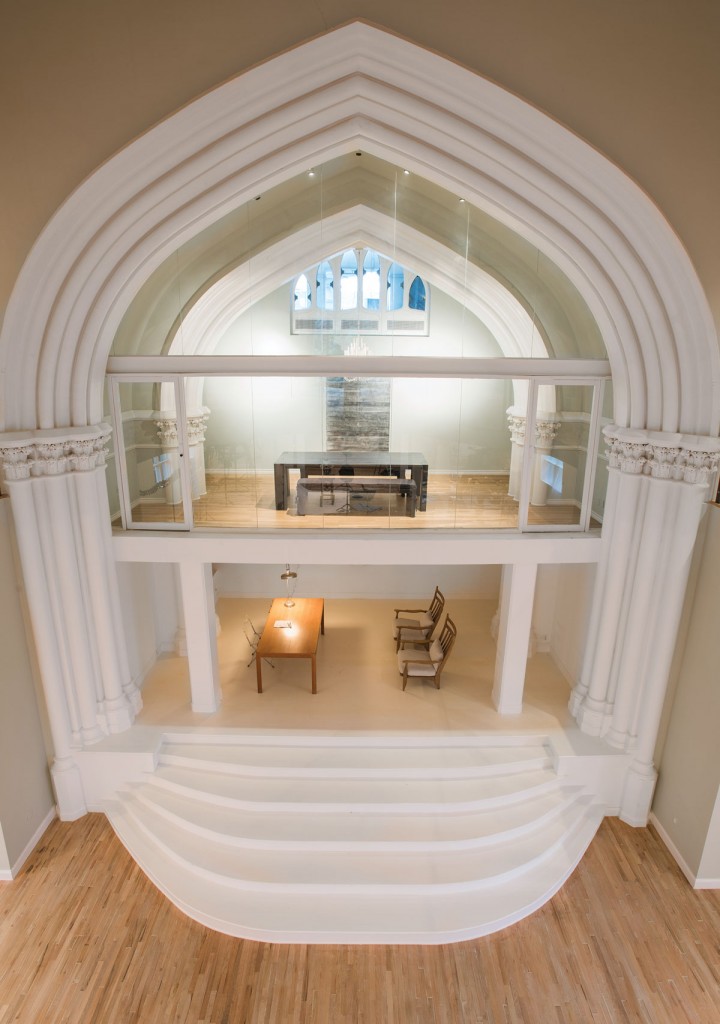 The choir loft and pulpit have been converted into meeting spaces.