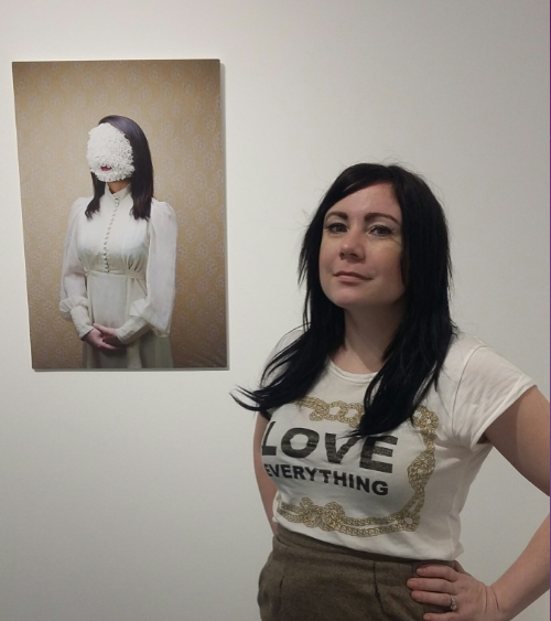 Alison Brady's solo at Capsule Gallery issues a feminist statement. The artist shown with one of her unsettling works, "Untitled," 2010. (Photo CDA)