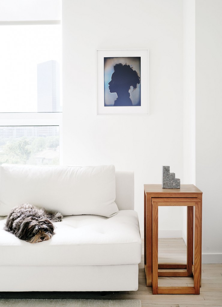 Close’s "Untitled (Kara)," 2007, a photograph of seminal artist Kara Walker. Josef Hoffmann vintage nesting tables, from 1905. Desk-sized granite sculpture by the late Jesús Moroles.
