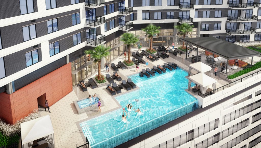 Bask in the sun during a dip in The Vantage's rooftop pool. 