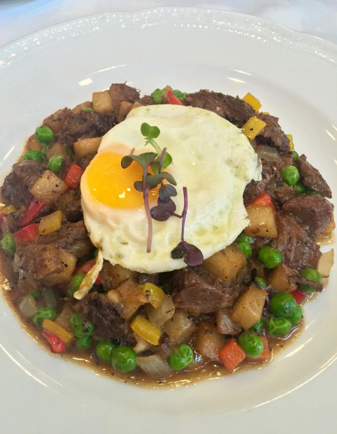Ciao Bello's beef cheek hash is a worthy brunch dish.