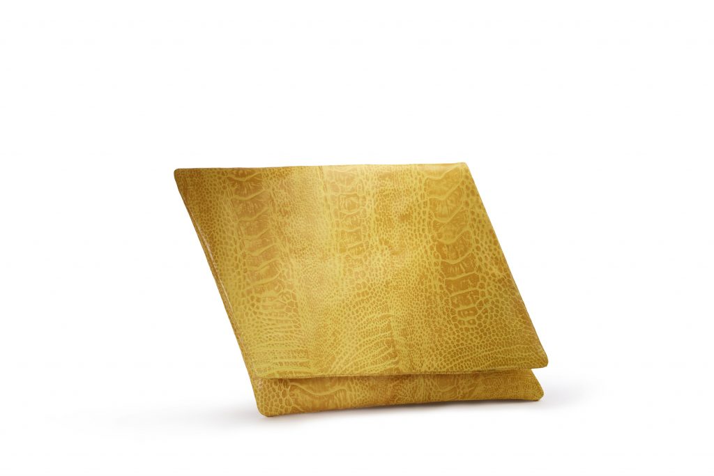 Rhombus clutch in canary ostrich skin, $1,250