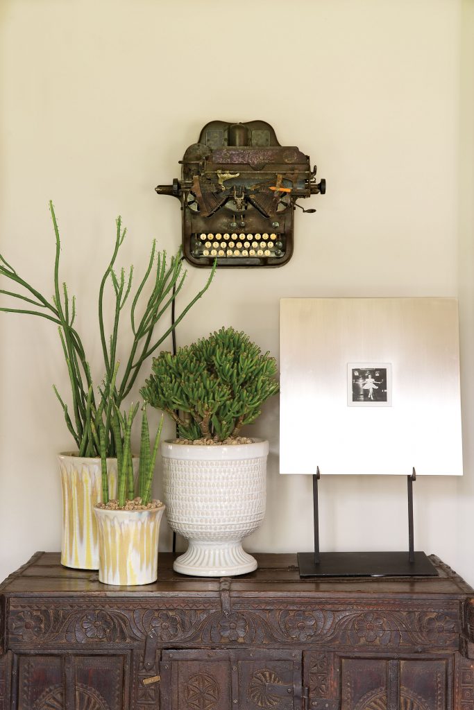 Vintage typewriter acts as unexpected art when fashioned to the wall.