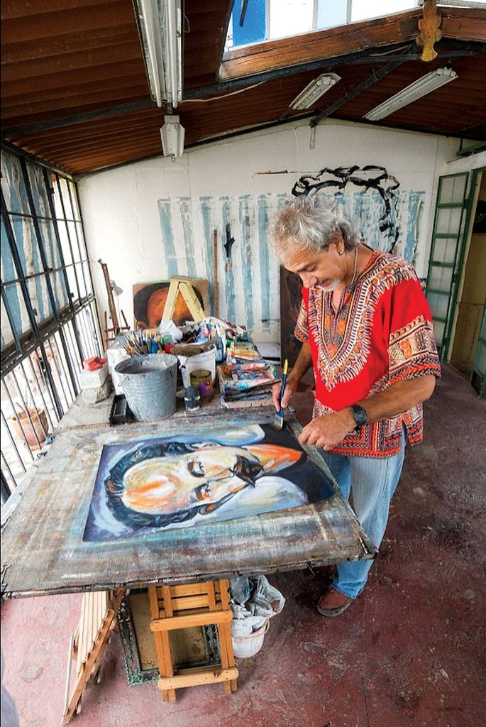 One of Harrison’s favorite Cuban artists, Kamyl Bullaudey, working in his home studio. 