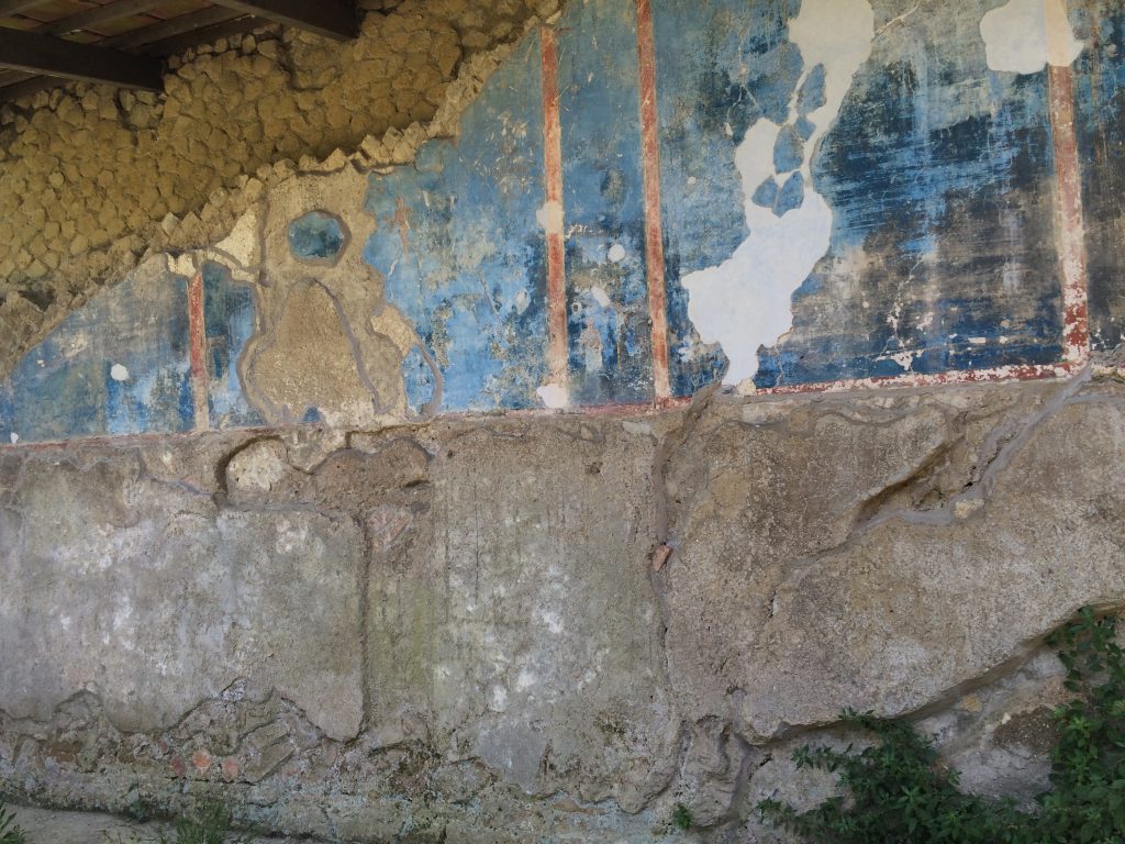 Ancient fresco with blue pigment from Egypt on the walls in Baia.