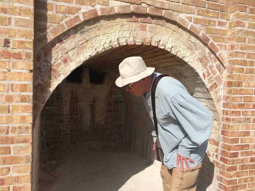 Earl leans in to feel the 160 degree vapors at Volcano Solfatara.