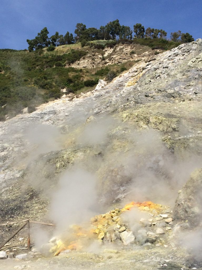 Hot sulfurous vapors escaping from the earth.