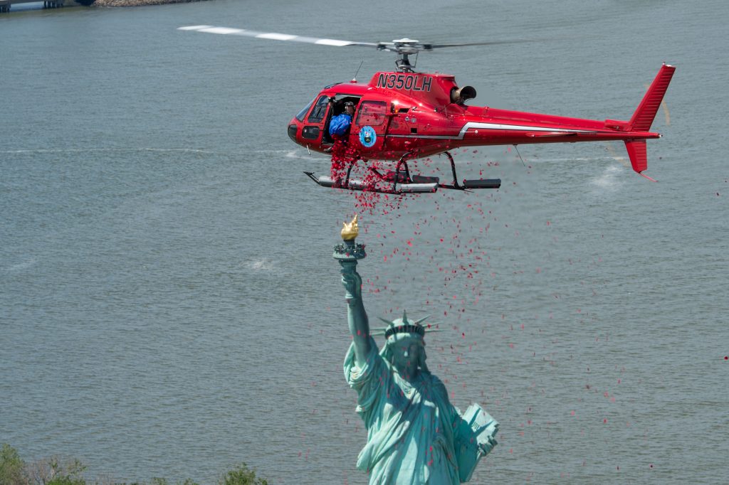 French Touch Events' most moving creation happened June 6, 2014, when it dropped one million rose petals over the Statue of Liberty on the 70th anniversary of D-Day. (Courtesy French Touch Events)