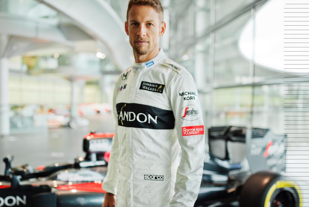 Jenson Button gives Michael Kors some Formula 1 star power.