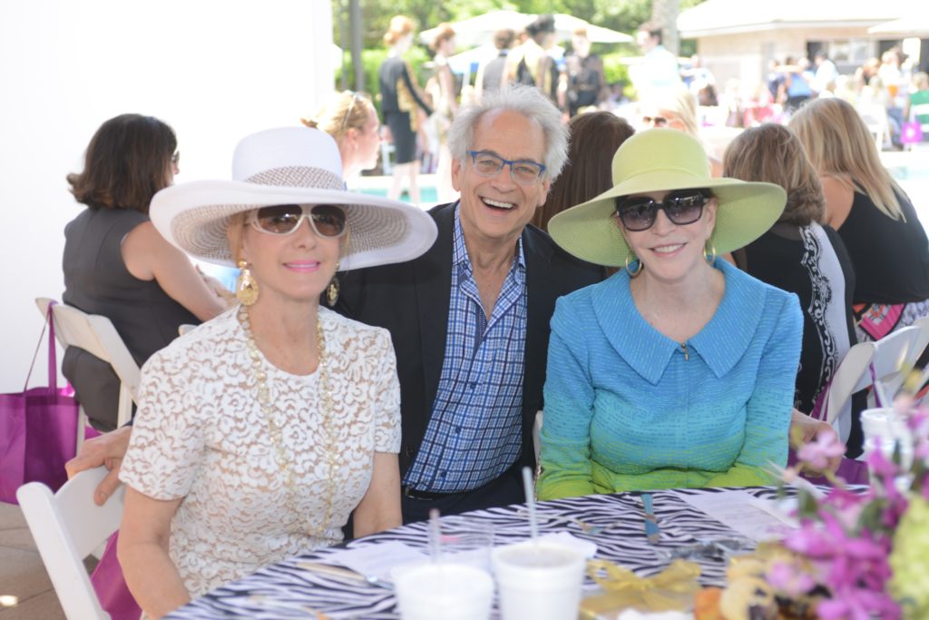 Sheridan Williams, Mickey Rosmarin, Shelby Hodge at the  annual River Oaks Country Club Tootsies fashion show, in 2016. A time when Shelby's suit jacket would zip closed. Not anymore.