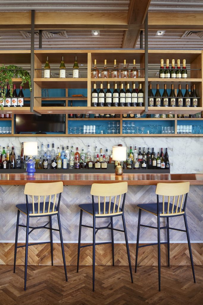 The drink menu features custom cocktails and a selection of red, white and rosé wines, plus a wide range of beers and saké.