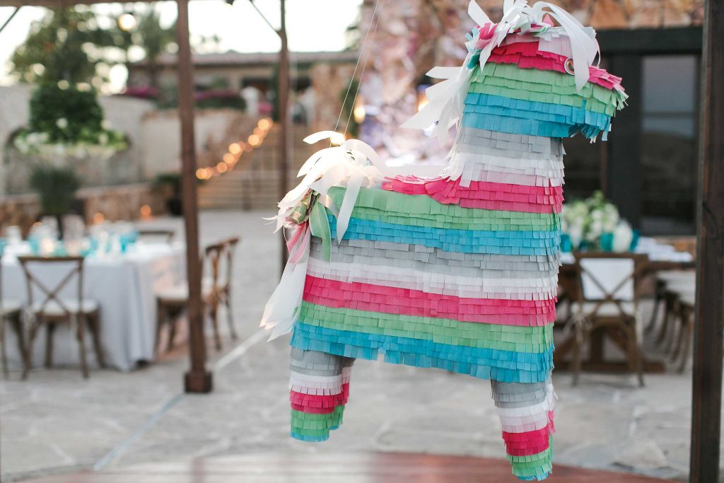 The custom piñata wedding cake (Photo by Jasmine Star)