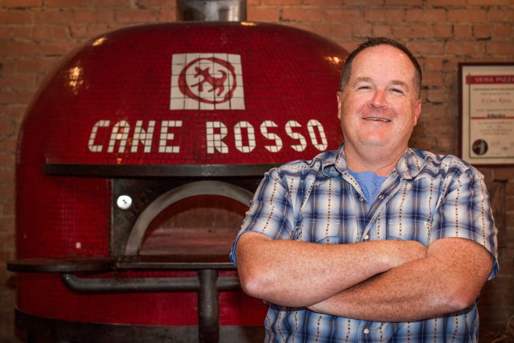 Cane Rosso owner Jay Jerrier named the restaurant for the Italian word for red dog. Jerrier has also started the Cane Rosso dog rescue to support local rescue groups. 
