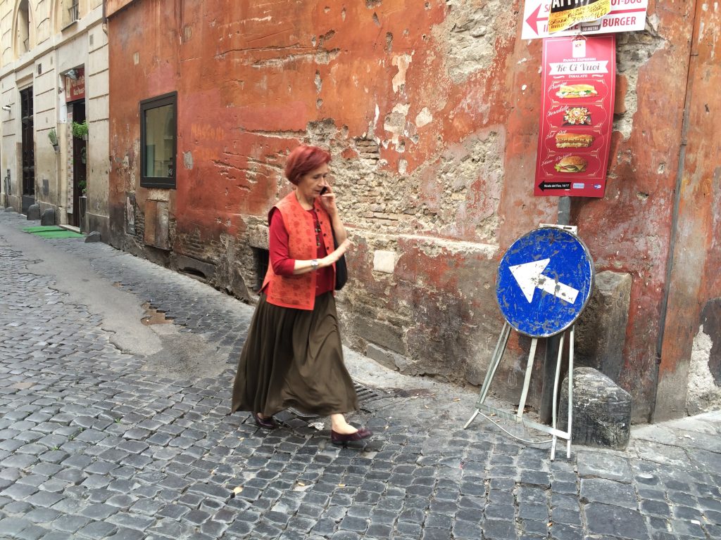 Ever onward on a cobblestone street.