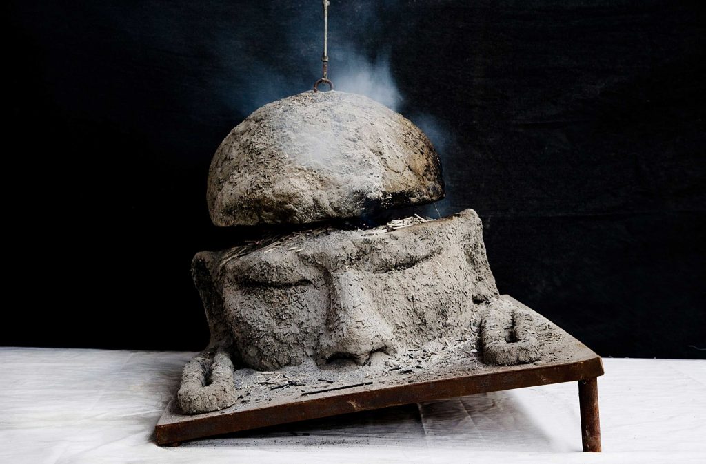 "Sudden Awakening," a large sculpture by Zhang Huan with incense burning inside, at the Fondation Louis Vuitton