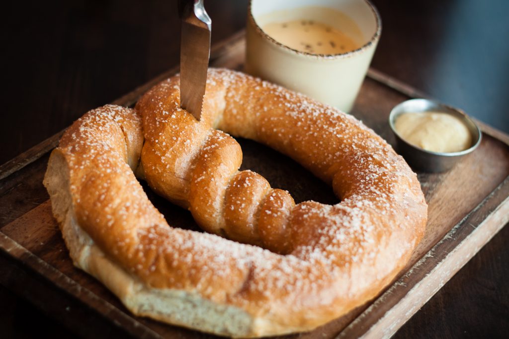Munch on a soft pretzel between bowls. 