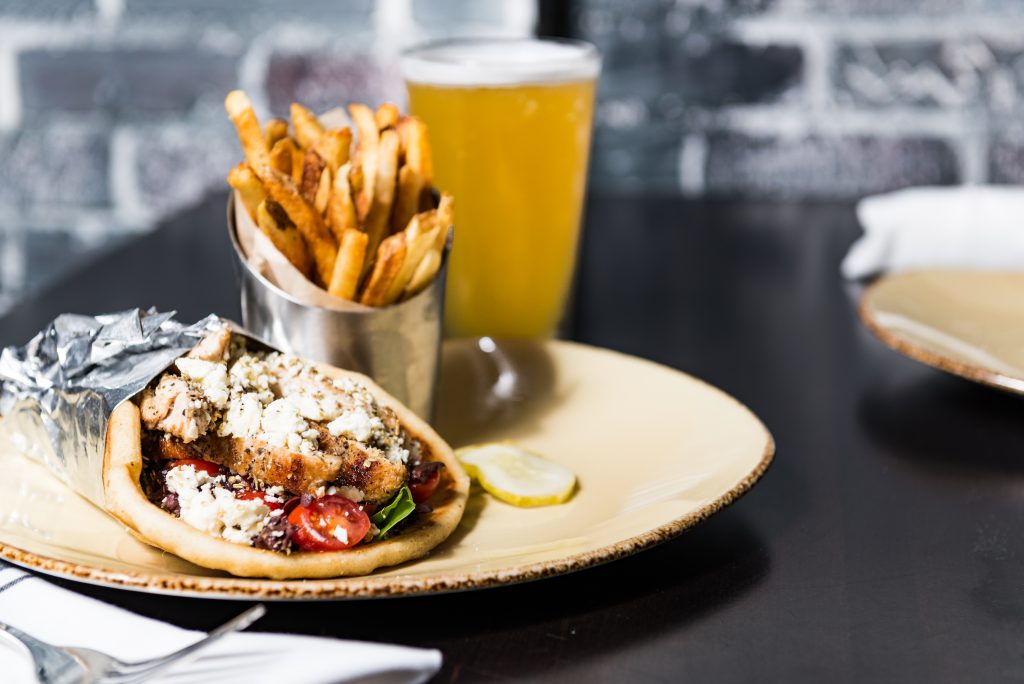 A twist on the classic gyro — a greek turkey pita stuffed with spinach, tomato, olives, feta, and tzatziki sauce.