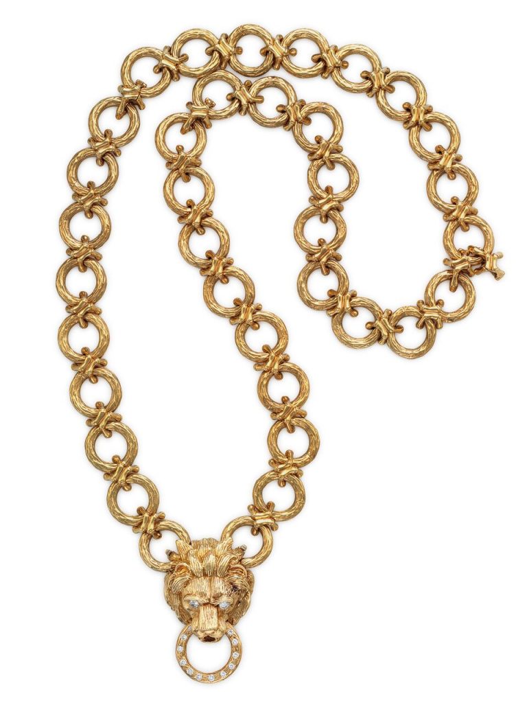 Mrs. Reagan's diamond and gold lion pendant brooch necklace by Van Cleef & Arpels