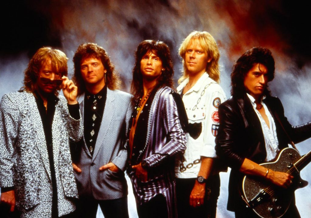 Aerosmith strike a glamour pose in the '70s.