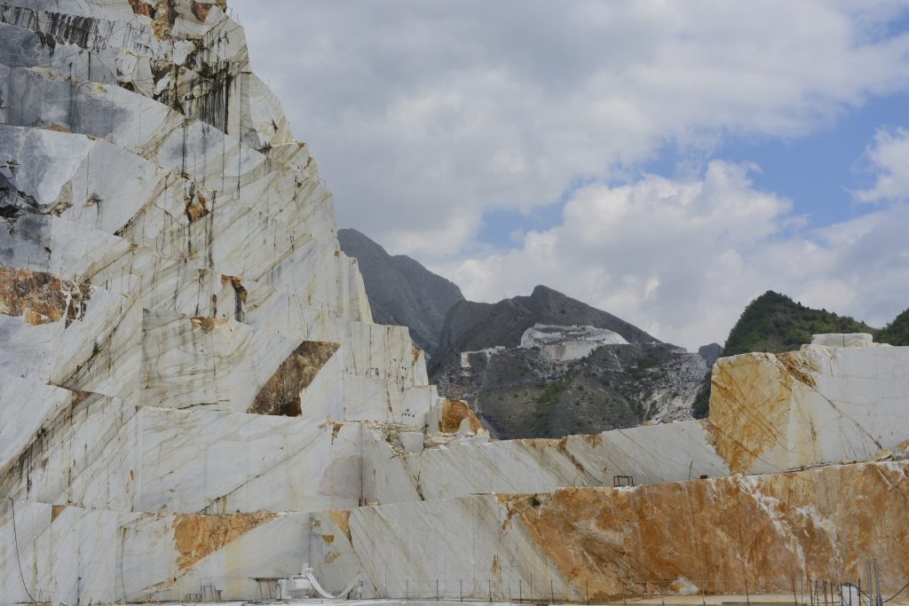 The program features first-class flights, meals at Michelin-rated restaurants, Land Rover quarry cave tours, and more.