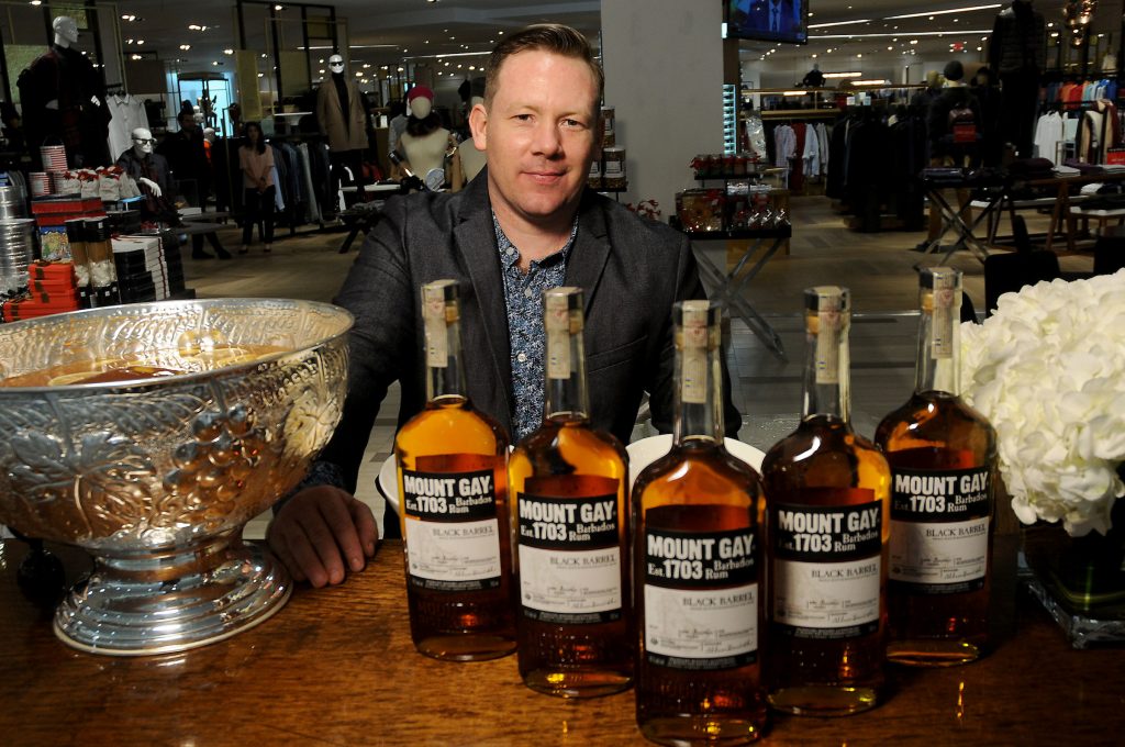 Alex Gregg at the Rum bar at the Saks Fifth Avenue Key to the Cure Wednesday Oct. 26,2016.(Dave Rossman photo)