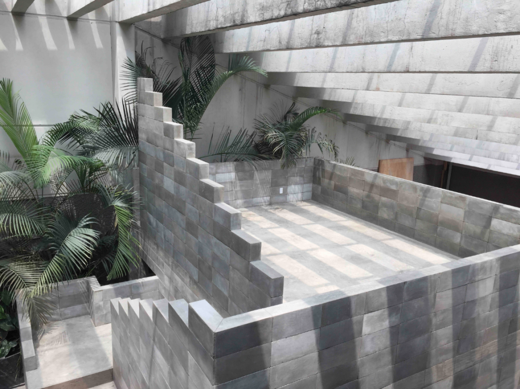 The home's geometric, concrete staircase